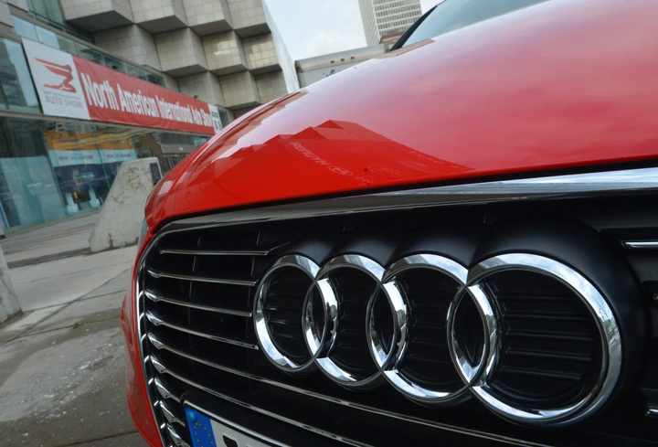 Audi storia logo: il significato dei quattro anelli uniti