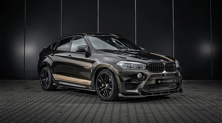 Bmw X6: ancora più aggressivo con il kit Manhart e Carlex